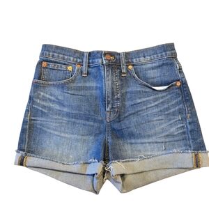 Madewell high rise denim shorts in size 27, featuring a cut-off style stretch
